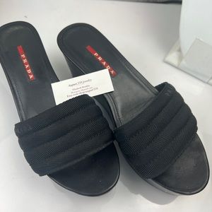 Prada 37.5 black slides with leather wedge
